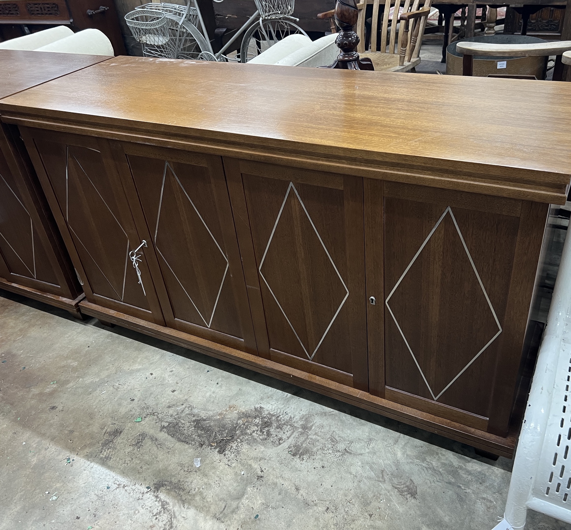 A contemporary South African mahogany chrome inlaid side cabinet, width 150cm, depth 50cm, height 85cm